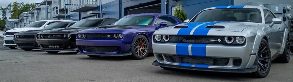 Big lineup of Hellcats, Redeye's, Durangos in front of the Dusterhoff Racing shop all built by Dusterhoff Racing