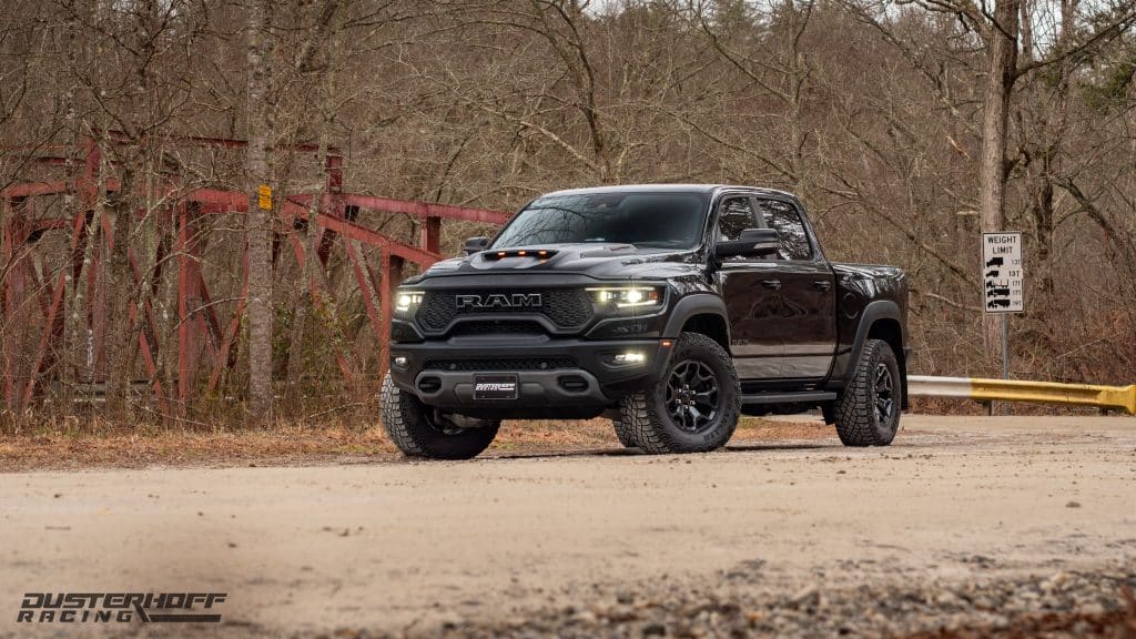 ram trx with a red steel bridge in the background